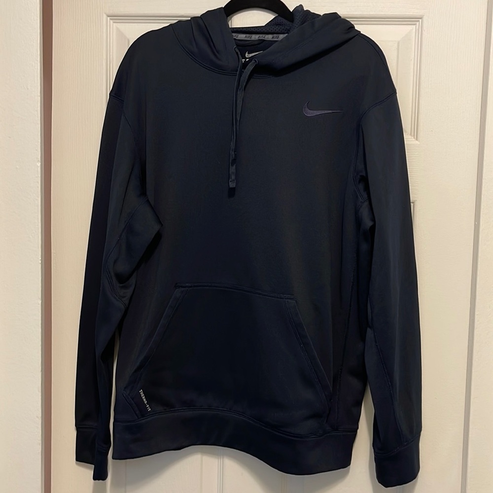 Dark, navy blue Nike thermal sweatshirt size large used, but like new